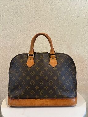 Louis Vuitton Monogram Alma Bag